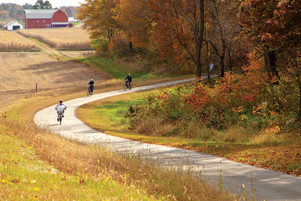 People biking on Pumpkinvine Nature Trail in Elkhart County, Indiana (photo by Danny Graber) People biking on Pumpkinvine Nature Trail in Elkhart County, Indiana (photo by Danny Graber)
